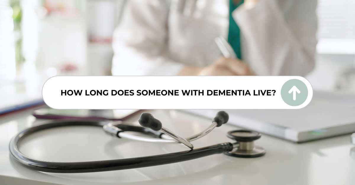 A doctor's desk featuring a stethoscope, with a text overlay reading 'How Long Does Someone With Dementia Live?' and an arrow icon indicating an upward trend, symbolizing the discussion of life expectancy in dementia.