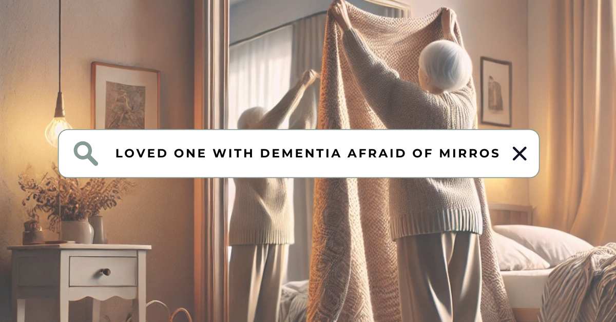 Elderly woman with dementia covering a mirror with a blanket in a warmly lit bedroom, illustrating mirror-related confusion and fear in dementia patients. Text overlay reads 'Loved one with dementia afraid of mirrors emphasizing common dementia behavior challenges.