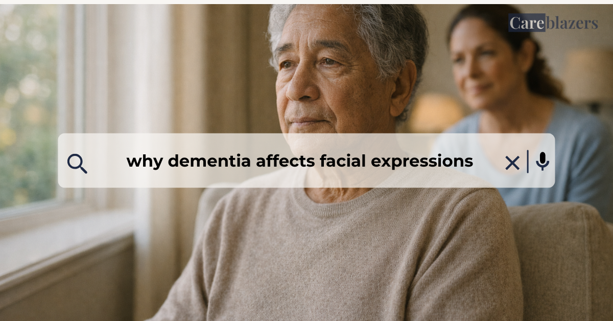 Older adult sitting by a window with a calm, neutral facial expression while a caregiver sits quietly nearby in soft natural light.