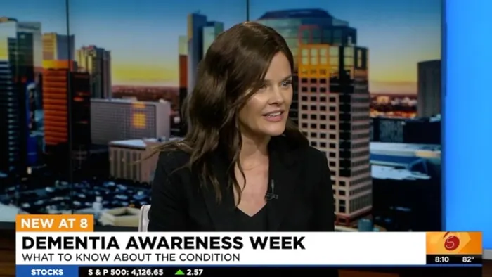 Dr. Natali Edmonds interviewed on a television news segment for Dementia Awareness Week