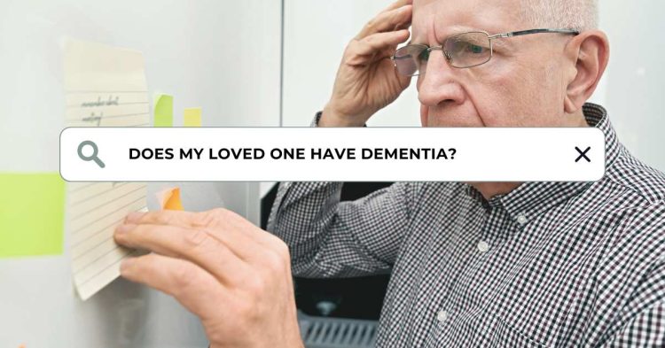 Senior man looking confused with notes, symbolizing the early warning signs of dementia.