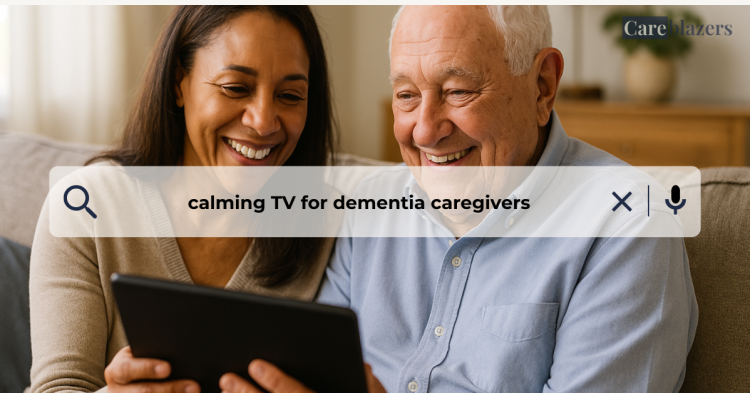 Middle-aged woman and elderly man smiling warmly while looking at a tablet together on a beige sofa in a softly lit living room.